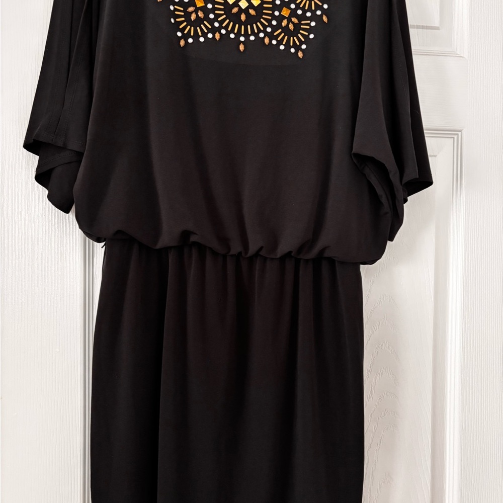 Never worn. Thalia Sodi Black Dress with gold & silver embellishments.